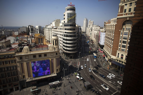 The Gran Via, one of the city's main shopping streets, is seen in this skyline view of Madrid, Spain, on Wednesday, March 28, 2012. Spain's progress in cleaning up its banking system means there is "absolutely no need" for it to fall back on European Stability Mechanism aid, a European Union official told reporters on condition of anonymity in Brussels today. Photographer: Angel Navarrete/Bloomberg
The Gran Via, one of the city’s main shopping streets, is seen in this view of Madrid on Wednesday. Bloomberg