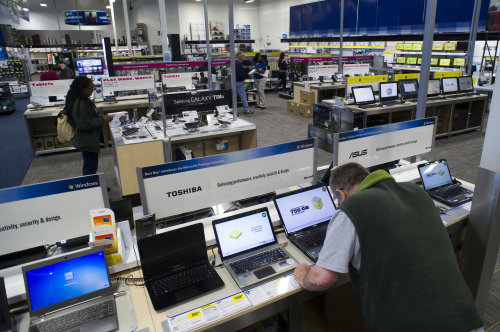 Customers browse computers and tablets at a Best Buy Co. store in Emeryville, California, U.S., on Tuesday, March 27, 2012. Best Buy Co., the electronics, appliance and entertainment retailer, is expected to release quarterly earnings on March 29. Photographer: David Paul Morris/Bloomberg
Customers browse computers and tablets at a Best Buy Co. store in Emeryville, California.  Bloomberg