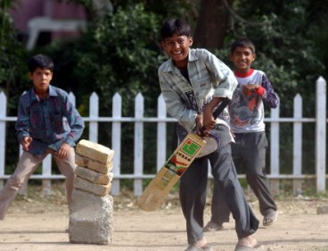 Pakistani children play cricket at a park in Islamabad. (MCT)