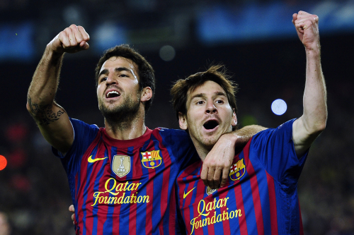 <YONHAP PHOTO-0223> FC Barcelona's Lionel Messi, from Argentina, right, reacts after scoring against AC Milan with his teammate Cesc Fabregas during the 2nd leg, quarterfinal Champions League soccer match at the Camp Nou, in Barcelona, Spain, Tuesday, April 3, 2012. (AP Photo/Manu Fernandez)/2012-04-04 07:03:09/ <저작권자 ⓒ 1980-2012 ㈜연합뉴스. 무단 전재 재배포 금지.>
Barcelona’s Lionel Messi (right) celebrates his goal with teammate Cesc Fabregas.  AP-Yonhap News