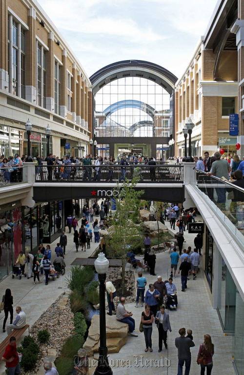 Shoppers walk around the newly opened City Creek Center in Salt Lake City, Utah.
Bloomberg
