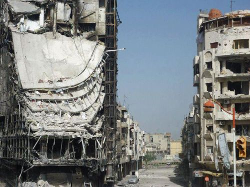 A handout picture released by the Syrian opposition Shaam News Network Wednesday shows the destroyed Muhazzab Rajub mall in the central Syrian city of Homs. (AFP-Yonhap News)