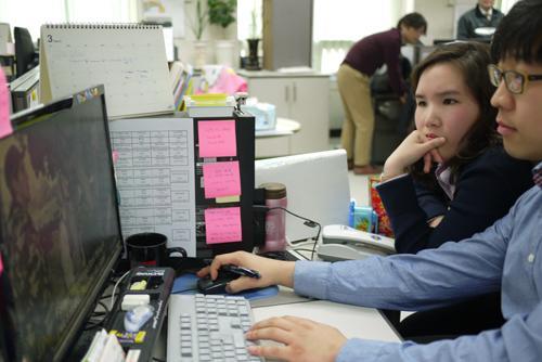 Park Eun-mi (left) screens submissions for the 2012 Seoul International Drama Awards.   Yonhap News