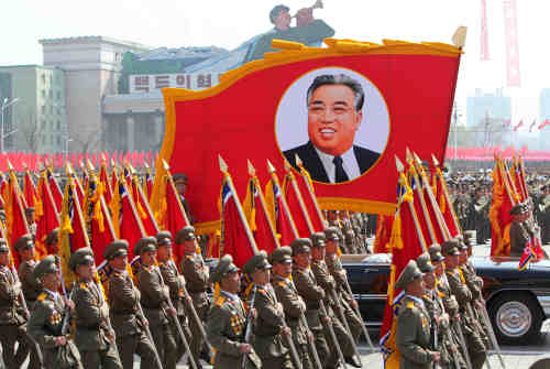 North Korean soldiers march at the military parade in Pyongyang on Sunday to mark the 100th anniversary of the birth of founding leader Kim Il-sung.(Xinhua)