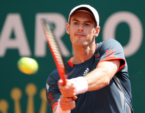 <YONHAP PHOTO-1302> Andy Murray of Great Britain plays a return to Serbia's Viktor Troicki, during their match of the Monte Carlo Tennis Masters tournament in Monaco, Tuesday, April 17, 2012. (AP Photo/Claude Paris)/2012-04-17 20:48:10/ <저작권자 ⓒ 1980-2012 ㈜연합뉴스. 무단 전재 재배포 금지.>
Andy Murray returns a shot against Viktor Troicki on Tuesday.  AP-Yonhap News