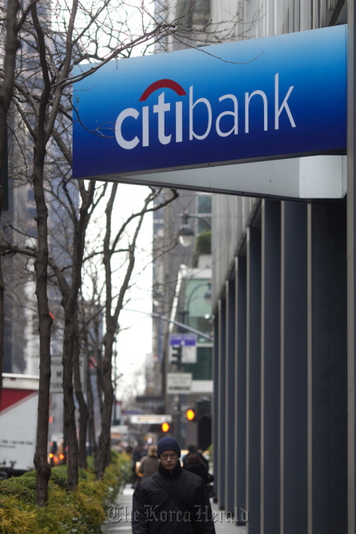 A man walks past Citigroup Inc. offices in New York. Bloomberg