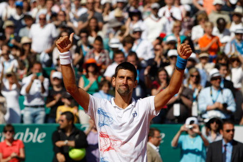 <YONHAP PHOTO-0670> Serbia's Novak Djokovic reacts after defeating Tomas Berdych of Czech Republic during their semifinal match of the Monte Carlo Tennis Masters tournament, in Monaco, Saturday, April 21, 2012. (AP Photo/Claude Paris)/2012-04-21 23:21:31/ <저작권자 ⓒ 1980-2012 ㈜연합뉴스. 무단 전재 재배포 금지.>
Novak Djokovic celebrates after defeating Tomas Berdych on Saturday.  AP-Yonhap News