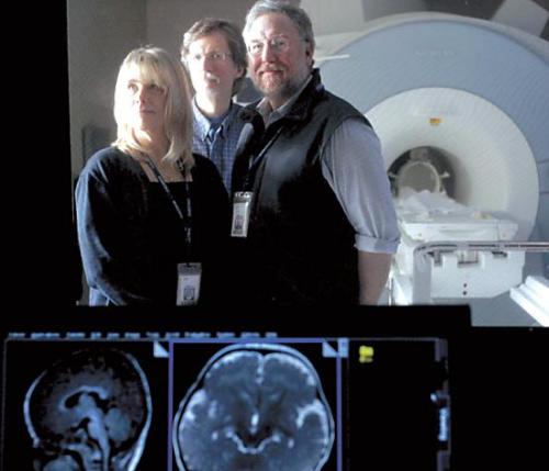 From left, Mindy Olson, MRI technician; Dr. Dennis Shaw, a pediatric
neuroradiologist; and Dr. Stephen Dager, a brain-imaging researcher,
are among investigators in the Infant Brain Imaging Study looking for early signs of autism in Seattle. MCT