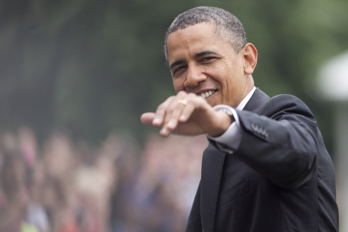 U.S. President Barack Obama waves as he arrives on the South Lawn of the White House in Washington, D.C., U.S., on Wednesday, May 2, 2012. Obama assured the American public the defeat of al-Qaeda is within reach as he marked the first anniversary of the killing of Osama bin Laden with a visit to Afghanistan and an agreement that prepares the way to bring U.S. troops home. Photographer: Andrew Harrer/Bloomberg *** Local Caption *** Barack Obama
U.S. President Barack Obama