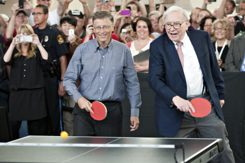 Warren Buffett, chairman of Berkshire Hathaway Inc., right, and Bill Gates, chairman of Microsoft Corp., play table tennis during an event at the annual shareholders meeting in Omaha, Nebraska, U.S., on Sunday, May 6, 2012. Berkshire Hathaway Inc. investment managers Todd Combs and Ted Weschler receive $1 million salaries and can earn more if their bets beat the Standard & Poor's 500 Index, Buffett said Sunday. Photographer: Daniel Acker/Bloomberg *** Local Caption *** Warren Buffett; Bill Gates
Warren Buffett (right), chairman of Berkshire Hathaway Inc., and Bill Gates, chairman of Microsoft Corp., play table tennis during an event at the annual shareholders meeting in Omaha, Nebraska, Sunday.  Bloomberg