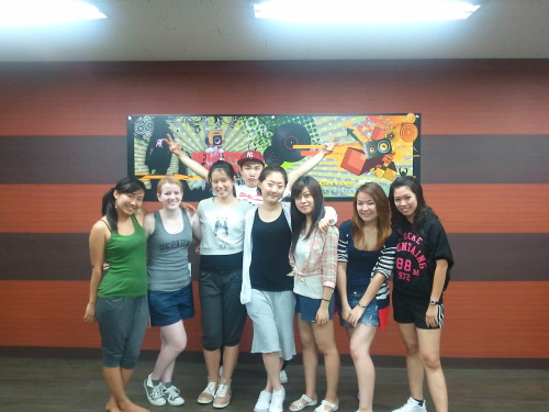 Negative Motion Dance Studio owner Hwang Tae-youn poises with global students from his studio. Negative Motion Dance Studio