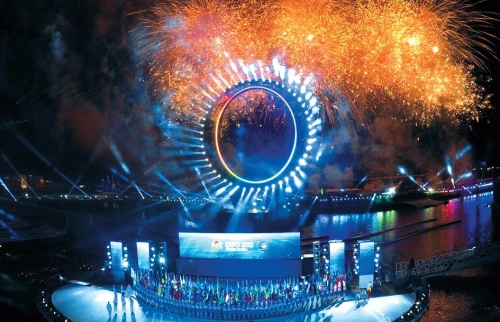Fireworks fill the skies as the Yeosu Expo celebrates the opening of its three-month run on Friday. (Park Hae-mook/The Korea Herald)