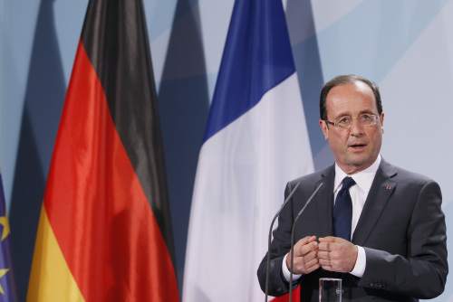 Francois Hollande, France's president, speaks during a news conference following the Franco-German summit at the German Chancellory in Berlin, Germany, on Tuesday, May 15, 2012. German Chancellor Angela Merkel and Hollande told Greeks they were ready to help support economic growth while warning that the coming election will be a referendum on Greece's euro membership. Photographer: Michele Tantussi/Bloomberg *** Local Caption *** Francois Hollande
Francois Hollande, France’s president, speaks during a news conference following the Franco-German summit at the German Chancellory in Berlin on Tuesday.  Bloomberg