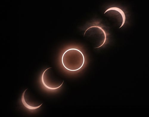 <YONHAP PHOTO-0789> This combination picture shows an annular solar eclipse seen from Tokyo on May 21, 2012 . For the first time in 932 years, a swathe of the country was able to see the annular solar eclipse, when the moon passes in front of the sun, blocking out all but an outer circle of light. AFP PHOTO / KAZUHIRO NOGI../2012-05-21 11:24:16/ <저작권자 ⓒ 1980-2012 ㈜연합뉴스. 무단 전재 재배포 금지.>
This combination picture shows a solar eclipse seen from Tokyo on Monday.