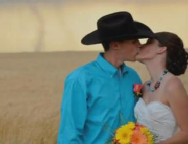 In the plains of central Kansas, tornadoes are so unremarkable that guests barely flinched as a barrel-racing bride wed her bull-riding groom with a twister dropping from the sky in the distance.
(YouTube)