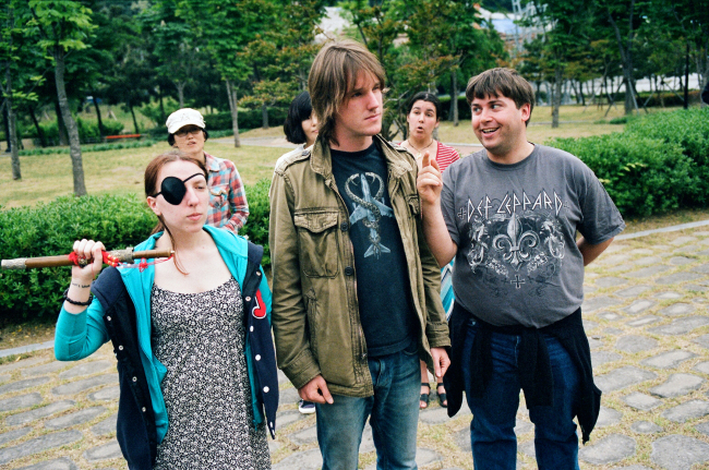 Patrick Sanders (front right) portrays Dogberry, the incompetent head of the Watch. From left are Jenna Hoag, Kim Hyun Sook, Sangmin Choe, Chris Ciosk, and Sarah Miller. Shakespeare in Busan