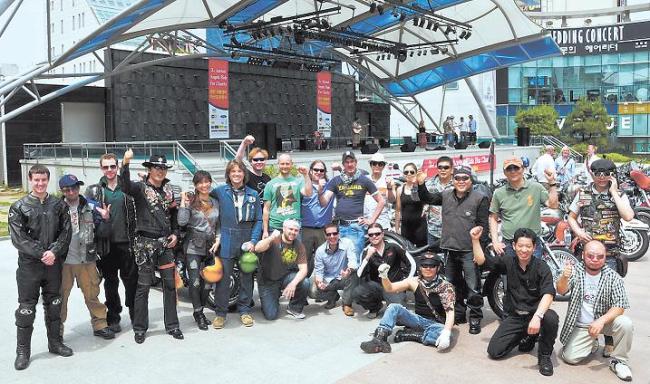 Motorcyclists pose in front of the venue before last year’s charity Angel Ride.