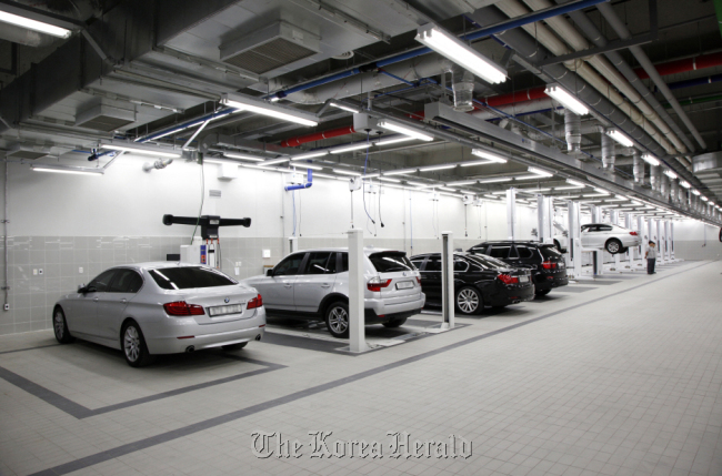 Vehicles are parked at a service center of BMW Korea in Bundang, Gyeonggi Province.  BMW Korea