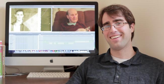Taylor Stanton sits in front of a monitor showing his grandfather (right) and his great uncle Herb Stankiewicz, who fought in the Korean War and never returned. Taylor Stanton