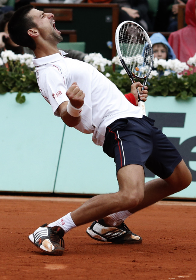 Serbia’s Novak Djokovic reacts as he defeats France’s Jo-Wilfried Tsonga during their quarterfinal match in the French Open tennis tournament on Tuesday.  (AP-Yonhap News)