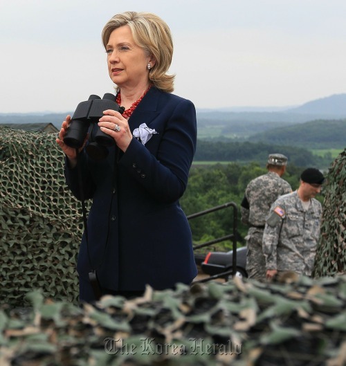 U.S. Secretary of State Hillary Clinton looks toward North Korea during a visit to observation post Ouellette at the Demilitarized Zone in Panmunjeom on July 22, 2010. The DMZ is a strip of land that divides North and South Korea at the 38th parallel. (AP-Yonhap News)