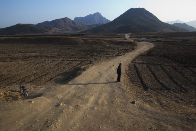 A North Korean official is seen from a train heading to North Pyeongan Province, about 50 kilometers south of the border town of Sinuiju along North Korea’s west coast.  AP-Yonhap News