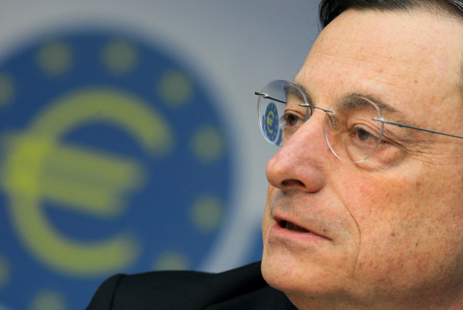 Mario Draghi, president of the European Central Bank, speaks during a news conference in Frankfurt on Wednesday.  (Bloomberg)