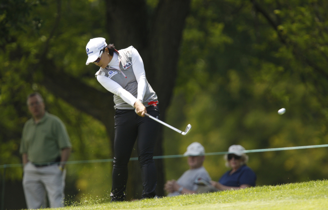 Pak Se-ri hits from the 17th fairway in the first round of the Wegmans LPGA Championship golf tournament at Locust Hill Country Club in Pittsford, New York, Thursday. AP-Yonhap News