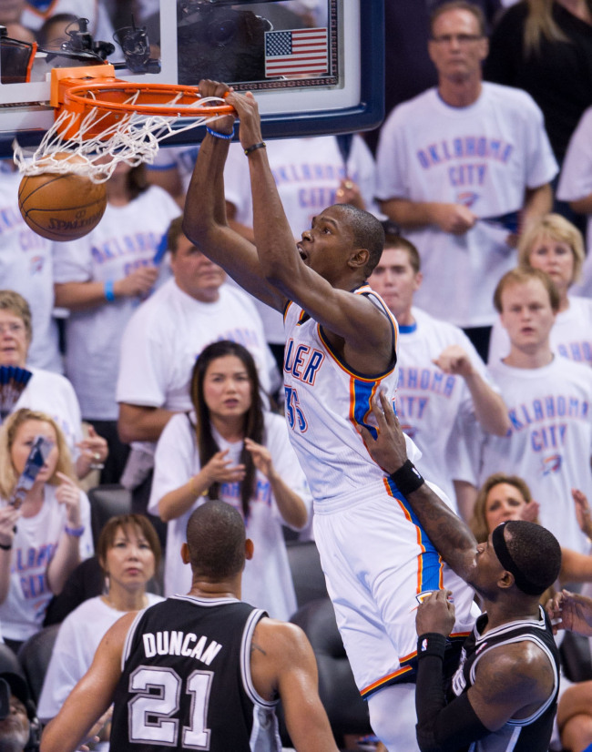 Oklahoma City Thunder forward Kevin Durant rises for a dunk during the Western Conference Finals last week.  Xinhua-Yonhap News