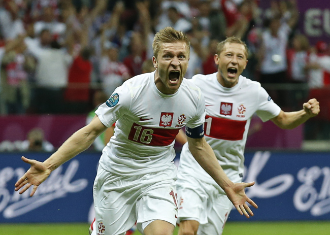Poland’s Jakub Blaszczykowski celebrates his goal on Tuesday.  AP-Yonhap News