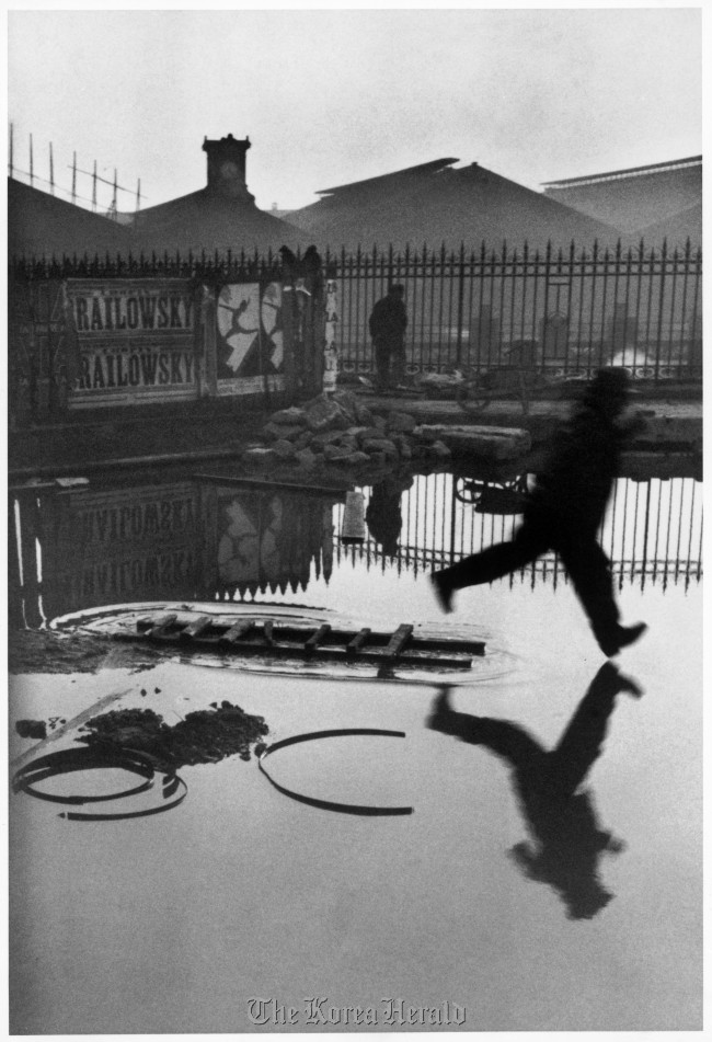 “Behind the Saint Lazare station, Paris.”  Henri Cartier-Bresson/Magnum Photos/EuroCreon