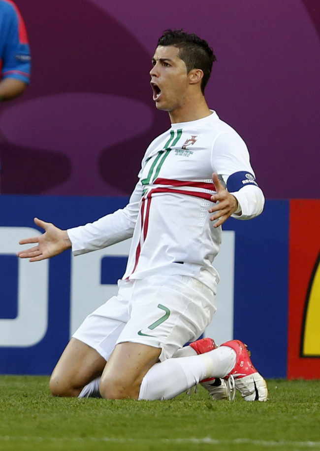 Portugal’s Cristiano Ronaldo disagrees with a referee’s call.  (AP-Yonhap News)