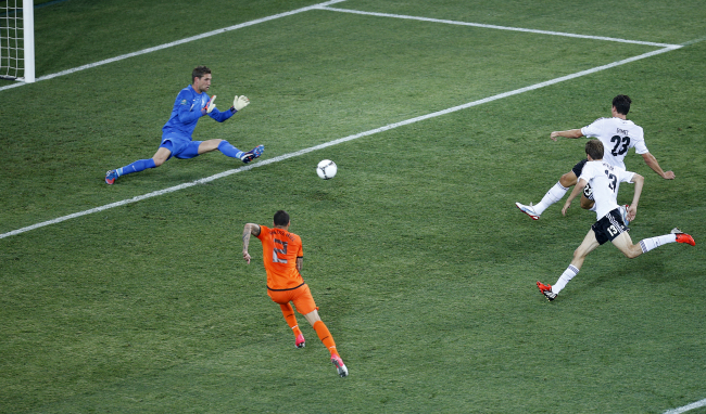 Germany’s Mario Gomez scores the opening goal.  AP-Yonhap News