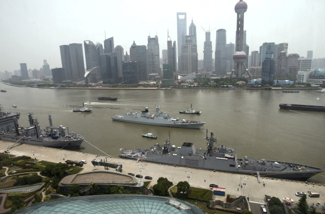 Indian navy ships dock as they arrive on the Bund in Shanghai, China.  AP-Yonhap News