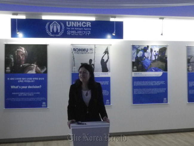 Anne Mary Campbell, a representative of UNHCR Korea, delivers her congratulatory speech at its exhibition on refugees at the Yeosu Expo on Sunday.  UNHCR Korea