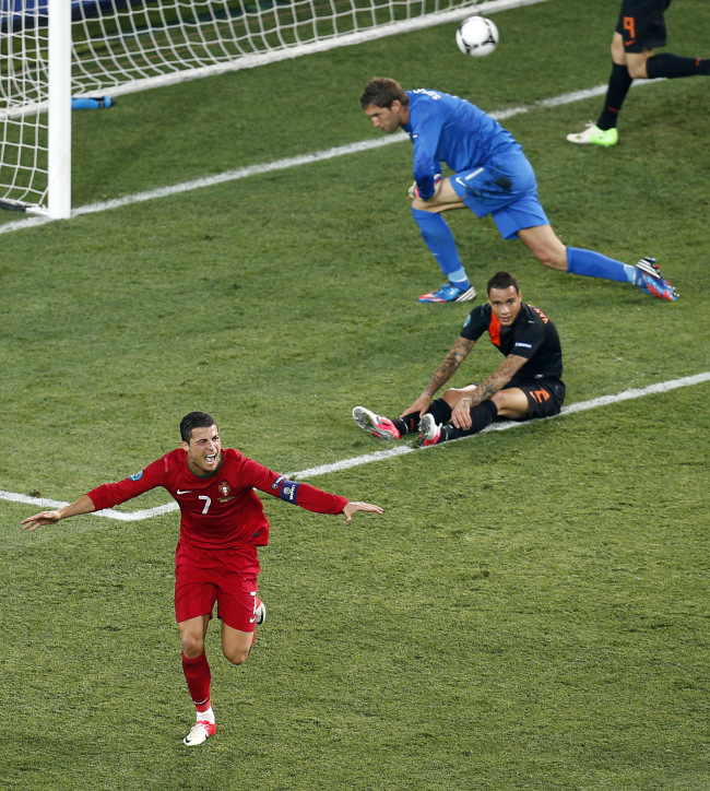Portugal’s Cristiano Ronaldo celebrates his second goal on Sunday.  (AP-Yonhap News)