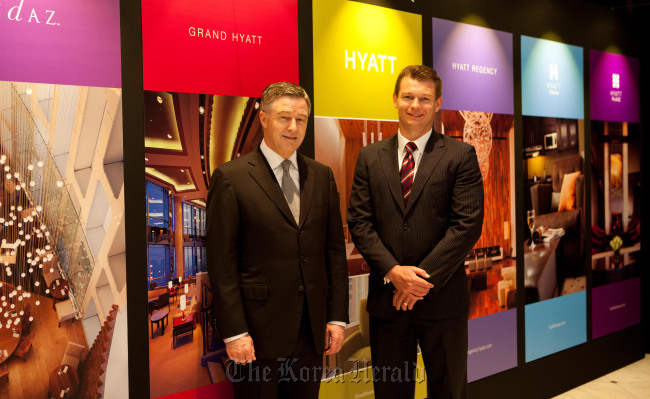 Hyatt Hotels Corporation area vice president of North Asia and Grand Hyatt Seoul general manager Peter Walshaw (left) and Park Hyatt Busan general manager Marc Von Arnim pose for a photo at the Grand Hyatt Seoul on Friday.  Hyatt Hotels Corporation