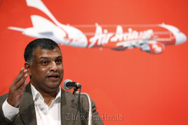Tony Fernandes, CEO of AirAsia Bhd, speaks during a news conference in Tokyo.  Bloomberg