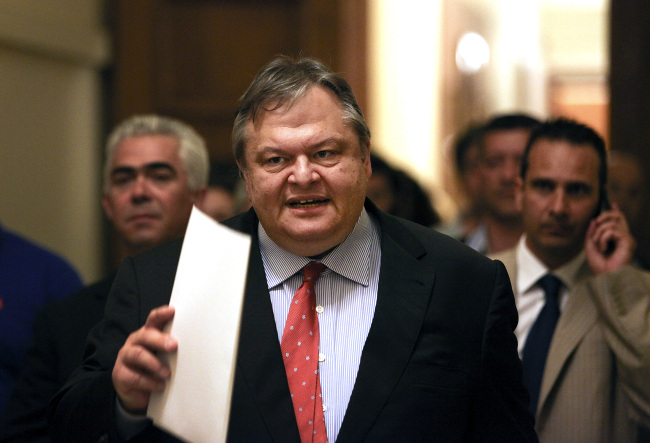 Evangelos Venizelos, leader of Pasok, arrives for a meeting at the Greek parliament to discuss the formation of a new government in
Athens on Monday.   (Bloomberg)