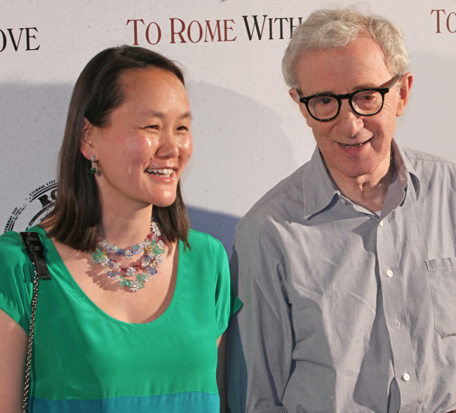 Woody Allen and his wife Soon-Yi Previn arrive for the French premiere of the film “To Rome With Love” in Paris on Monday.   (UPI-Yonhap News)