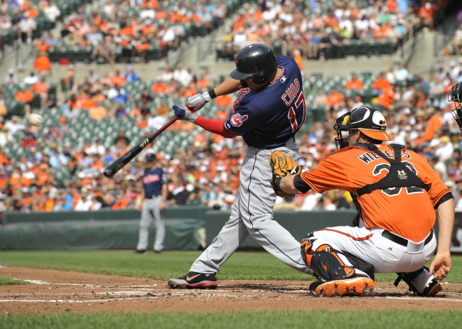 Cleveland Indians' Shin-Soo Choo connects for a solo home run against the Baltimore Orioles during the second inning of a baseball game Saturday. (AP-Yonhap News)