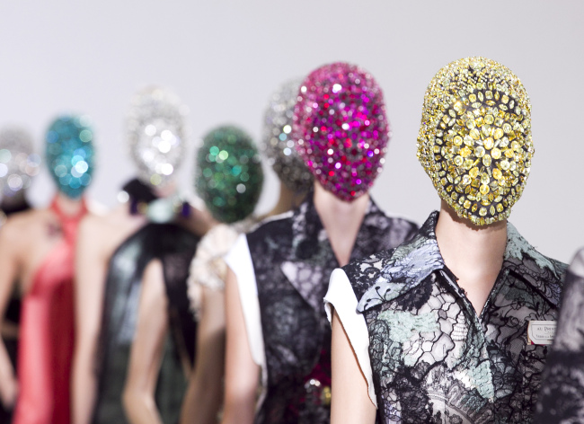 Models wear creations by Belgian designer Martin Margiela as part of his presentation for Women’ s Fall Winter 2012-13 haute couture fashion collection, for fashion house in Paris, Wednesday. AP-Yonhap News