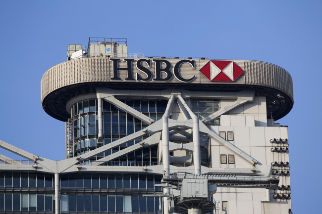 The HSBC logo is displayed on top of the company’s headquarters in Hong Kong, China, Thursday.      Bloomberg