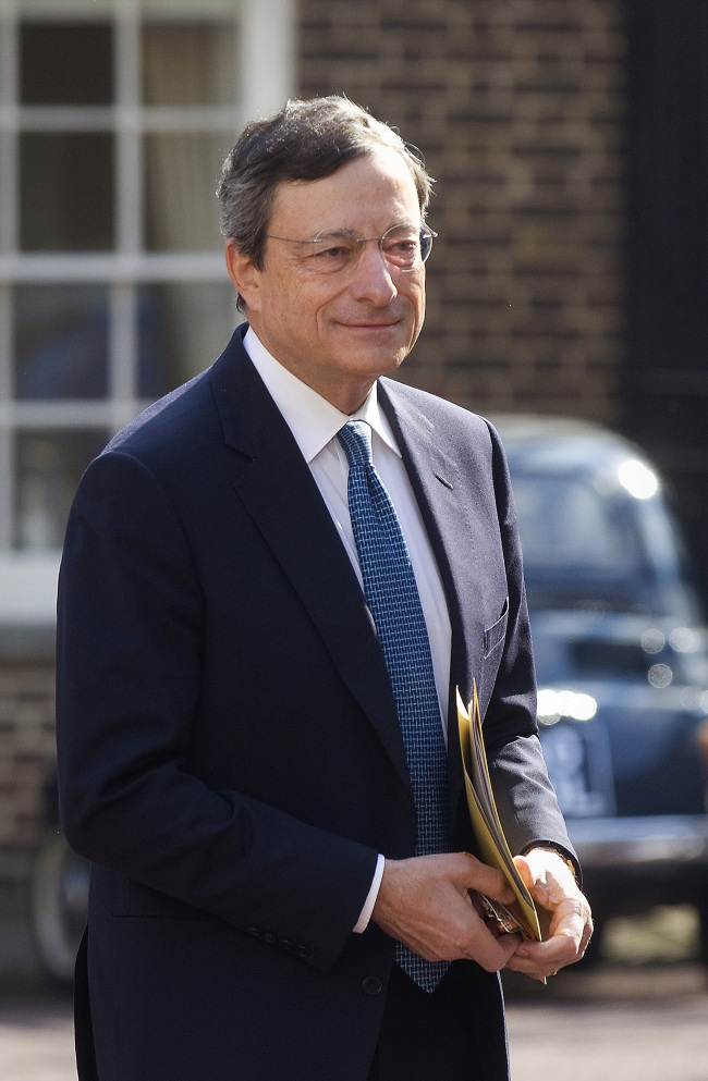 ECB president Mario Draghi arrives for a global business summit in London on Thursday.  Bloomberg