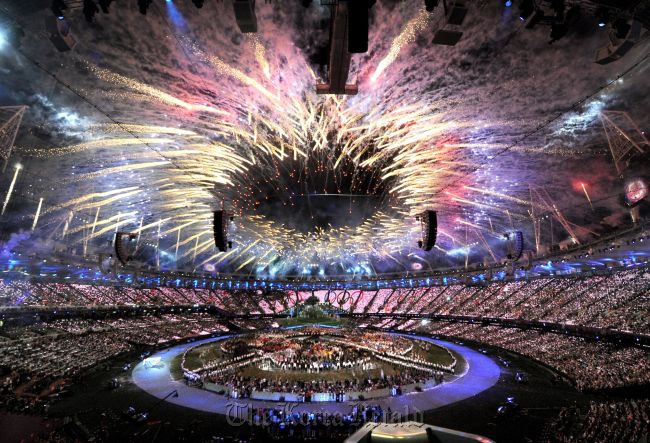 Fireworks light up the Olympic Stadium during the Opening Ceremony for the 2012 Summer Olympics, Saturday in London. (AP-Yonhap News)