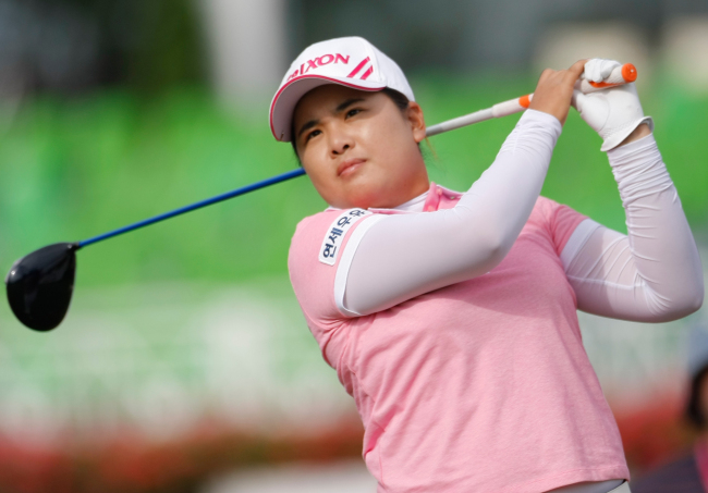 <YONHAP PHOTO-2161> Inbee Park of South Korea plays on the first hole during the third round of the Evian Masters women's golf tournament in Evian, eastern France, Saturday, July 28, 2012. (AP Photo/Claude Paris)/2012-07-28 17:02:09/ <저작권자 ⓒ 1980-2012 ㈜연합뉴스. 무단 전재 재배포 금지.>
Park In-bee plays on the first hole during the third round of the Evian Masters women’s golf tournament in Evian, eastern France, Saturday.  AP-Yonhap News