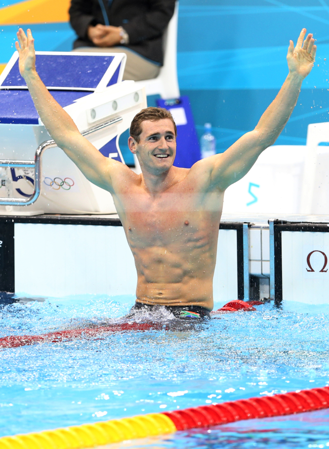 World record wins for van der Burgh, Vollmer