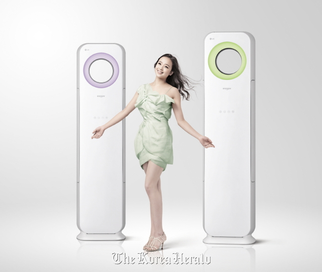Gymnast Son Yeon-jae showcases the LG Whisen air conditioner.   LG Electronics