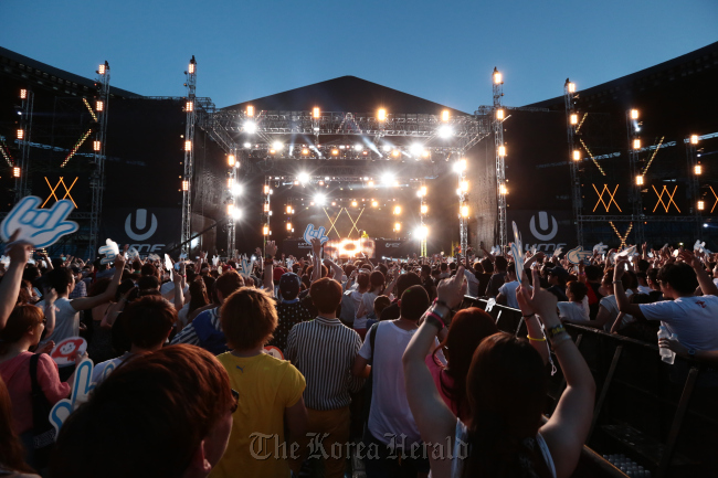 Top world DJs light up the stage at Ultimate Music Festival.    UMF Korea