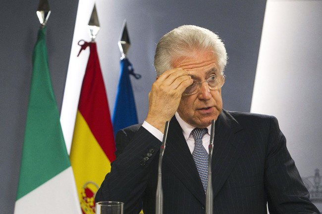 Mario Monti, Italy’s prime minister, gestures during a news conference in Madrid on Thursday. (Bloomberg)